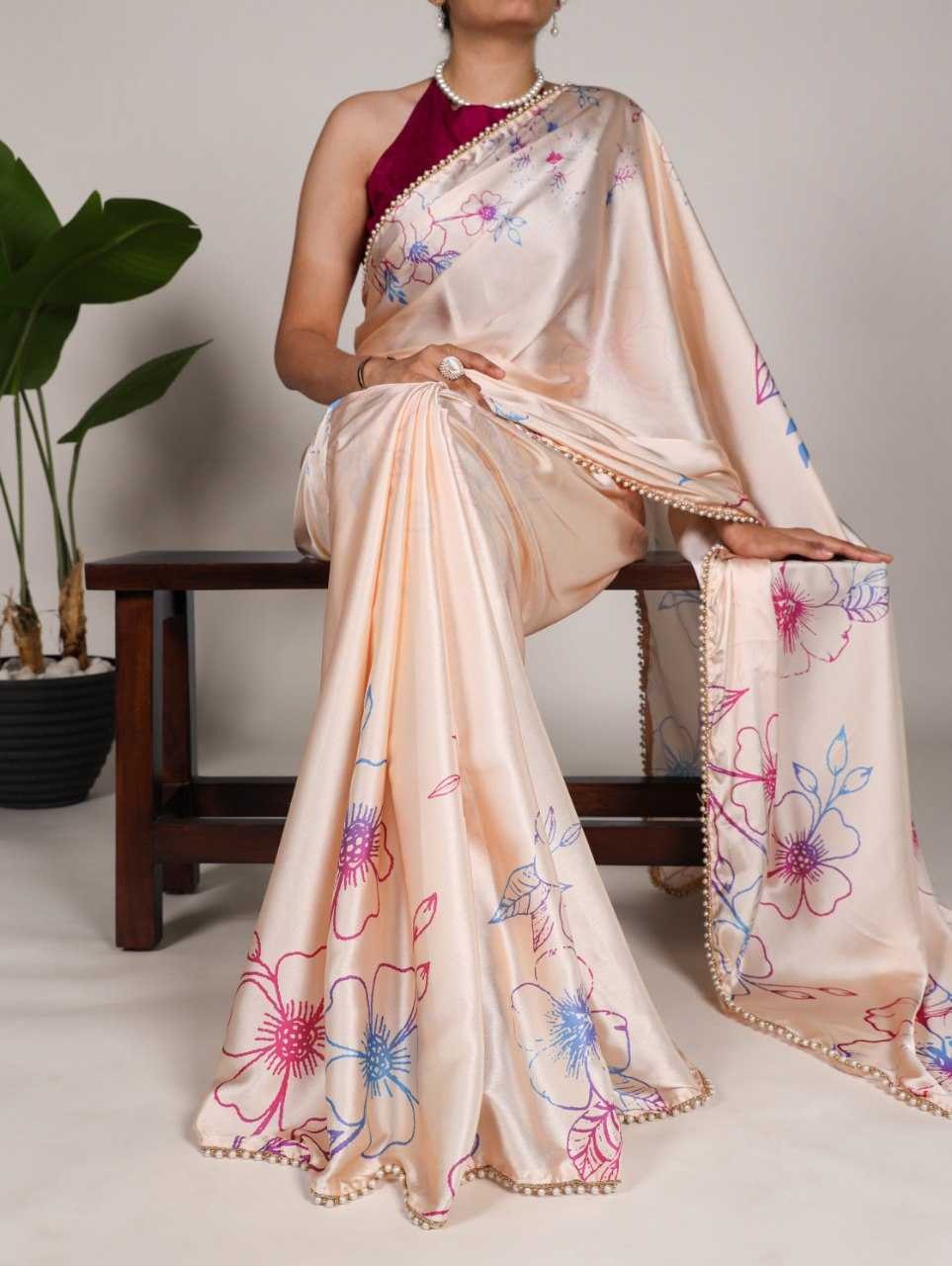 Pearl petals: Delicate satin saree